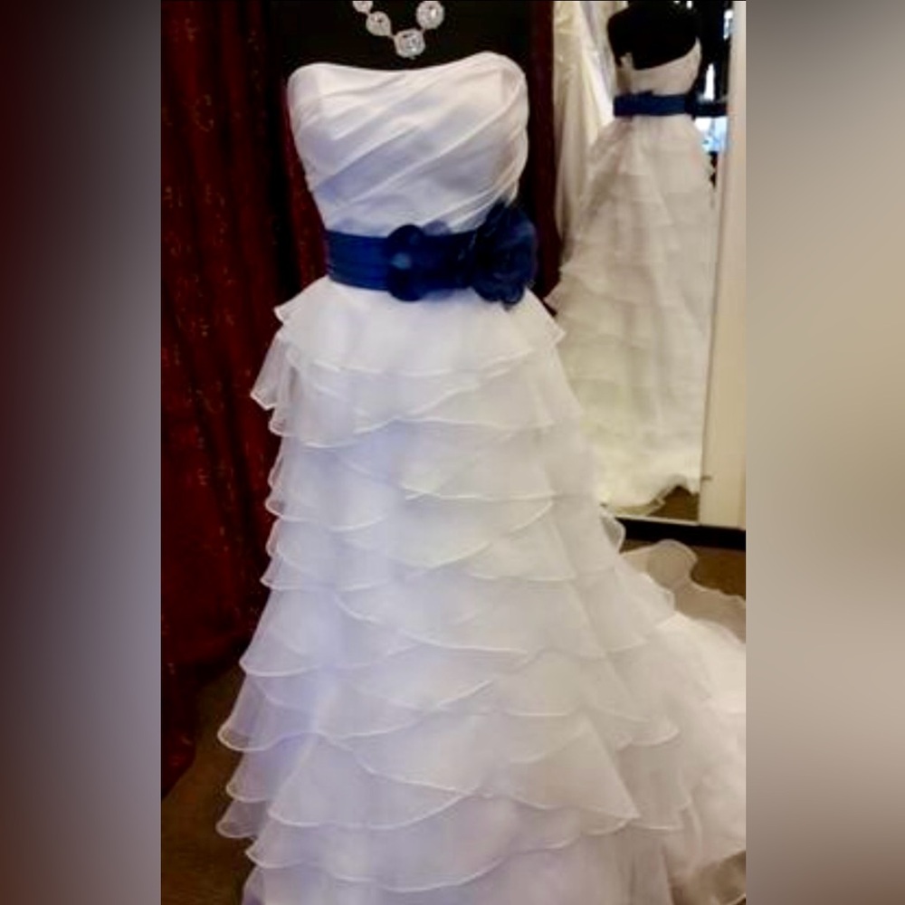 Beautiful strapless, A line cascading ruffle Alfred Angelo wedding dress